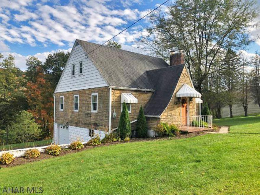 Forest Hills Schools.. Stone & aluminum sided 1 1/2 sty. home with 4 bedrooms, 1 bathroom, 1 car integral garage on a 0.89 of an acre lot - bordered by woods. Entryway leading into LR with wood burning fireplace, dining room, updated kitchen, 2 bedrooms & a full updated bathroom. 2 additional BR's on the 2nd floor & a bonus/sitting room with 2 lg. closets-walk-in cedar closet & cubbie hole. All appliances included. HW floors. Walk-out basement with a work shop. Covered side porch. New shed - 2017, Hot water tank - 2020, 100 amp breakers, 2 furnaces - oil & coal. A must see!!