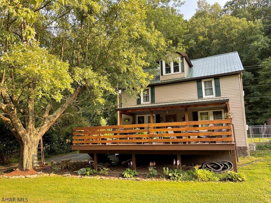 This home is what most would consider a "MUST SEE" home! This incredibly unique home includes 3 bedrooms with 1 full bath on the main floor, and 1 three-quarter bath on the second floor on a 4.93 acre lot. Includes a shed in the back yard used for storage, and a large detached garage which offers plenty of space for a hobbyist, or to be used for parking. The large yard offers a bunch of space; currently, the owners are maintaining strawberry, grape, and a few other plants in the yard. Please schedule an appointment to come and view this property for yourself, it's just waiting to be someone's dream home!