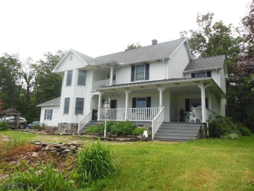 A beautiful 2 story in a quiet and secluded location on a dead-end lane (no drive-bys pease--special needs).  3 bedrooms, 2/5 baths, 2 car garage, shed(s), vinyl sided geothermal forced-air heat with central air.  Has views for 30 miles!  Front covered porch, rear deck, oak kitchen, heat sources if needed.  Very unique and private!