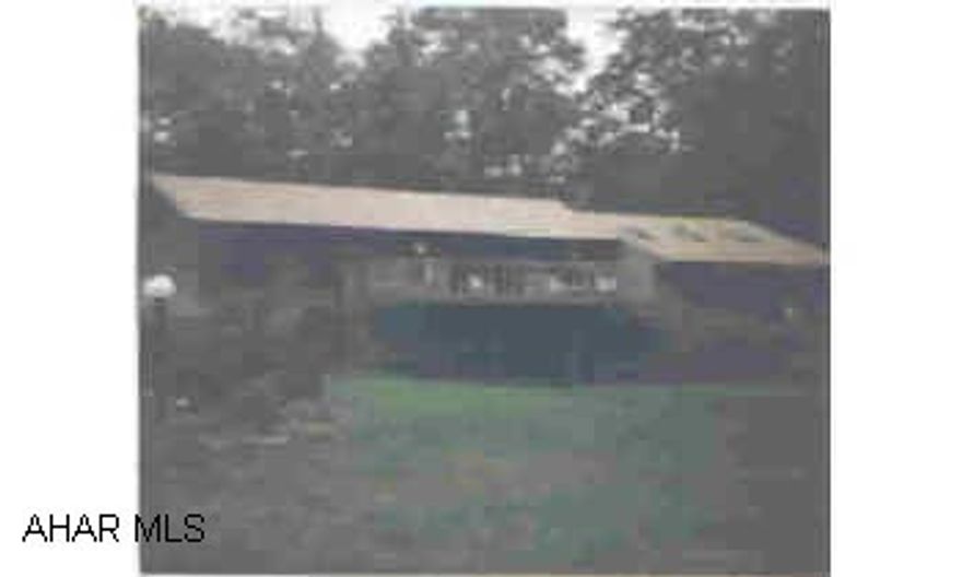 Gorgeous, wonderful large 3 bedroom, 2 bath contemporary. 3.6 mile down Sinking Valley Road from the Kettle. Picture perfect setting on 4.4 acres, secluded, wooded setting! Wow! Seller disc. available. Tax Amount 1800+/-. Assessment 16110 + 495 Gorgeous, wonderful large 3 bedroom, 2 bath contemporary. 3.6 mile down Sinking Valley Road from the Kettle. Picture perfect setting on 4.4 acres, secluded, wooded setting! Wow! Seller disc. available. Tax Amount 1800+/-. Assessment 16110 + 495  Sunroom.