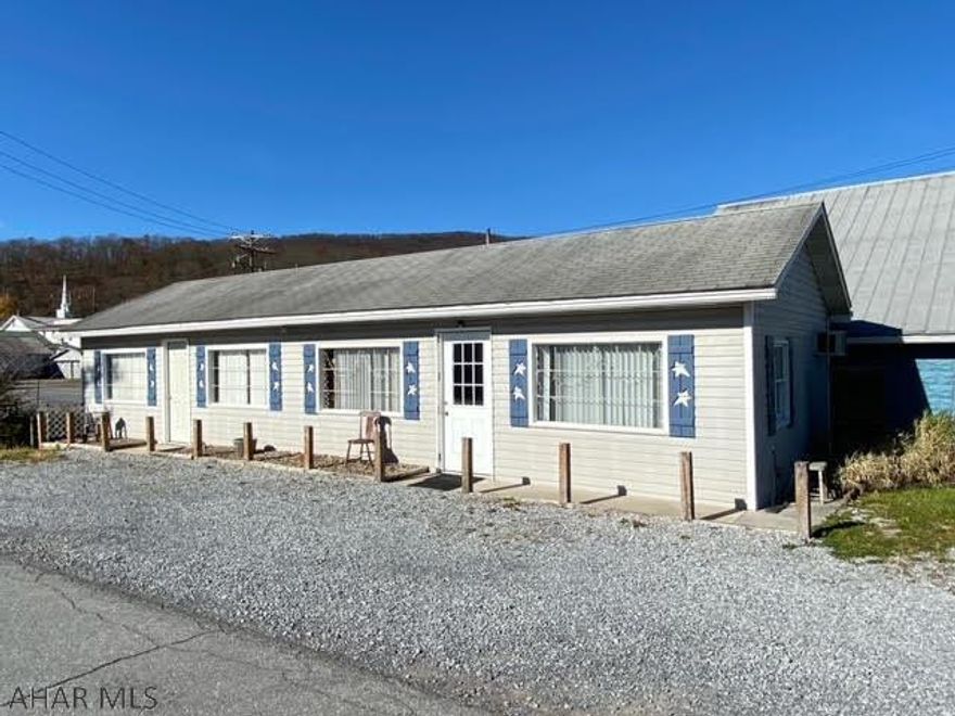 Perfect affordable income opportunity!  Your opportunity to stop renting your business space or create a new business on this highly visible street in Everett Borough.  Awesome parking availability with 6+ off street spaces.  Could easily create a drive-thru area.  Currently used as a "Craftique Shop".  Was previously a cafe, beauty salon, and retail space.  Property has open floor plan with great natural light.  Half bath, two at-grade entrances, and a private 6x14 back room.  Previous kitchen area with water hookups for commercial sink.  PEX hook-ups also already in place for possible salon sink.  So many options with this space.  Newer flooring, electric water heater, two wall AC's and individually controlled electric heating.  Ready for you to make it your own!