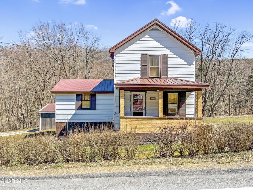 Welcome to 201 Chickaree Hill Road in the Blacklick Valley School Districts. This property sits on over half an acre of ground and features a 2 story home w/ updates throughout, large pole building, 2 sheds, & a detached 2 car garage. All buildings except the sheds feature new metal roofing. As you enter the home you will be greeted by a spacious cedar lined living room w/ plenty of natural light. Off of the living room is an eat-in kitchen w/ included appliances, mud room, full updated bath, & a first floor bedroom. On the second floor is your huge master bedroom and a bonus room that could easily be turned into a third bedroom. The home also includes a brand new hot water tank. This property sits on the outskirts of Vintondale and is minutes from Route 22. Call to schedule your private tour today!