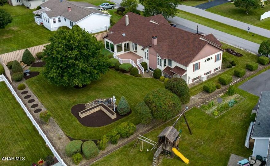 Open House, Saturday, 11/5/22, 1-3 p.m. Woodlawn Terrace Development. This very well maintained brick and vinyl 1-story home was built with the following upgrades and features: 2x6 outside stud walls; studs and floor joists 16'' on center; heavy duty roof trusses; 3/4'' tongue & groove subfloor; gas lines to stove, dryer, 50- gallon hot water tank; 2 fireplaces; gas cooking grill in sunroom with a high quality exhaust; a backup generator; all type k copper water supply lines; two 200 amp square D electrical entrance w/automatic transfer switch to generator; new lifetime roof (2019); 1st-floor A/C; new Anderson windows and doors in the sunroom; quality wood burning stove in the sunroom that vents into a masonry flue; custom kitchen cabinets w/corner hutch and china cabinet to match; all custom-made red oak moldings and doors; HIGH ceilings in the lower level; and a nicely landscaped yard.
Bonus 1: An Enormous Craft Room/Workshop w/Built-Ins and Extras, Bonus 2 : Three Living Areas, Bonus 3: An Outdoor Fountain and Pond, Bonus 4: An All-Season Sunroom