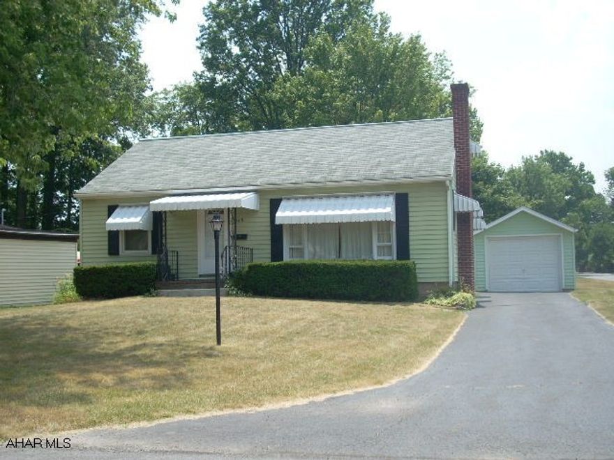 Nice Cape Cod hoome on corner lot with 1 car garage. Brick fireplace in Living Room, hardwood floors under carpeting. Heating system new in 2009. Nice back covered patio. Large basement. 2nd floor is finished, alcoved with heat and A/C. Newer windows.New 100 AMP electrical service.
