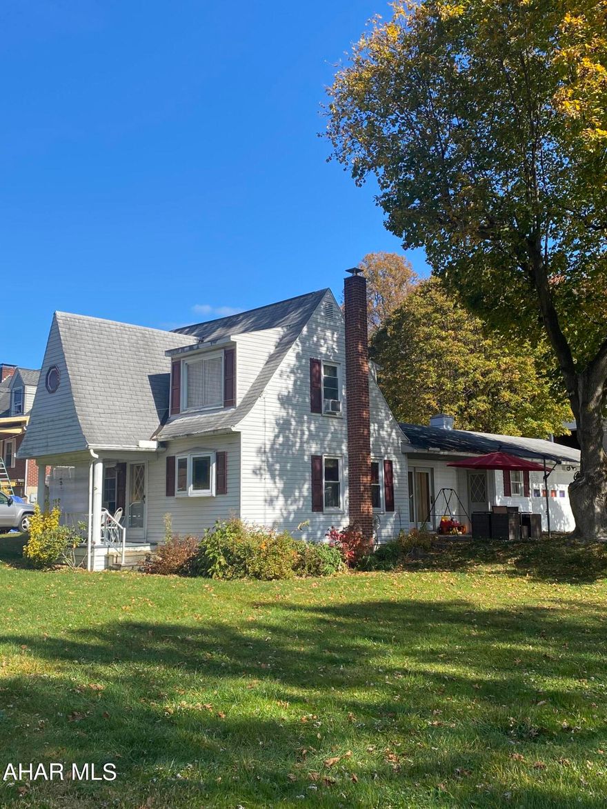 Looking for the perfect starter home? This is it! Adorable move in ready a-frame in a beautiful location just outside of Everett. Lovely spacious yard backs up to Summit Street, the perfect neighborhood area for a walk or bike ride. Interior features an eat-in kitchen, big living room with sliding doors to walk out to the cute patio space, an office/den area, two bedrooms, one half bath/main floor laundry, and one full bath. Attached two car garage keeps your vehicles snow free in the winter. Picturesque and ready to move-in. Set up your showing today!