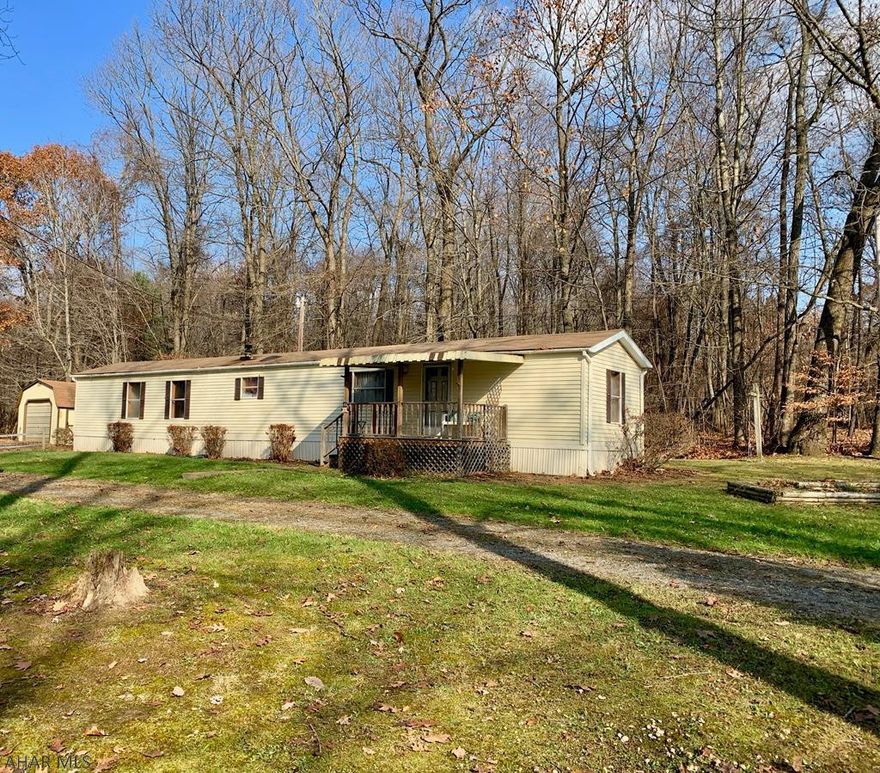 Nice single wide on a Great flat acre of land outside Coalport borough. Great starter home, allowing to build later down the road. Master bedroom with full bath and garden tub. Open floor plan, garage , shed and deck.
