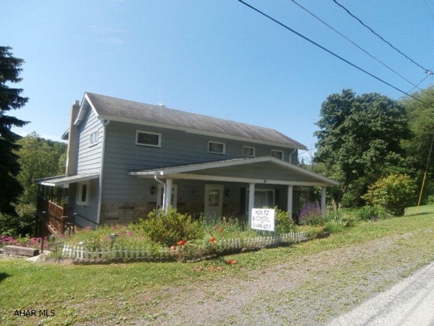 To settle estate. Alum sided two story 5 bedroom home on a large lot. Home has had updating including roof, bath, furnace, hot water tank, some windows and floor coverings. Nice rear deck. Should go USDA. Great home for the $$.