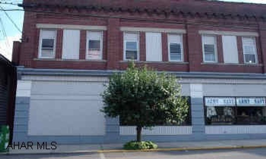 TWO STORY 4 UNIT BRICK COMMERCIAL BUILDING 3 UNITS, CURRENTLY RENTED, VERY SPACIOUS OFFICE SPACE AVAILABLE. PRIME LOCATION TWO STORY COMMERCIAL BUILDING WITH AMPLE SPACE TO ALLOW FOR MANY POSSIBILITIES. BUYER TO ALLOW THE TENANTS 60 DAYS AFTER SETTLEMENT TO MOVE IF THEY CHOOSE TO MOVE. CATHLEEN TUBO TO SET UP ALL SHOWINGS.