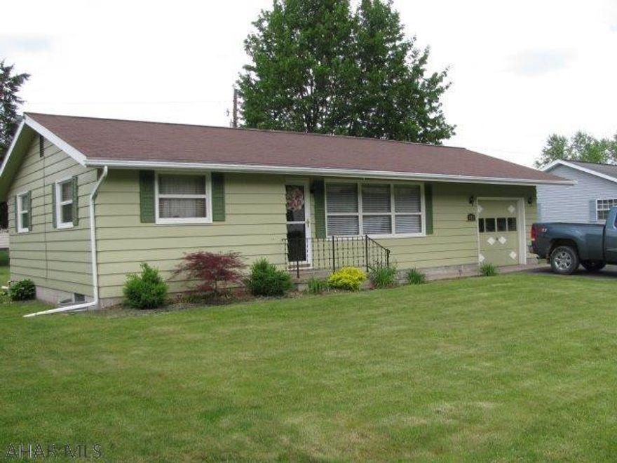 Tipton ranch home on a level lot! Gorgeous new kitchen with all new appliances! Spacious LR w/  hard wood floors, partially finished basement and covered patio. Attached garage, New A/C, lighting and so much more