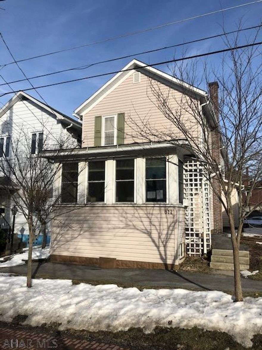 3BR 1.5 BA Home with 1 car detached garage being sold AS-IS in Portage!