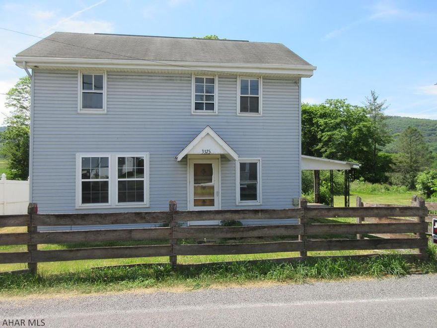 Williamsburg 2 story vinyl home on 1/2 acre with large detached shed and carport. Large covered patio and nice, country setting. Needs TLC. AS-IS sale. Seller will make no repairs.