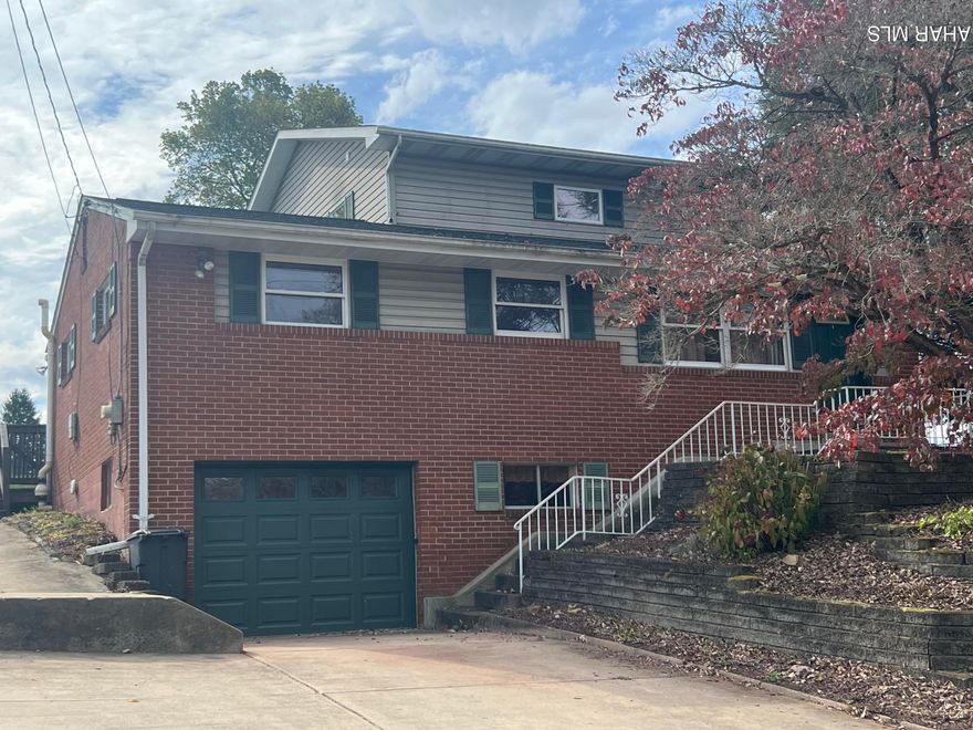 Welcome to country living just minutes from schools and shopping in this stunning 5 bedroom 2-story home. The French doors lead to the living room which flows seamlessly into the totally remodeled kitchen, the focal point of the main level. Upgrades include granite countertops, custom cabinets and stainless-steel appliances with a commercial grade gas stove. The island with lots of storage and solid maple live-edge countertop adds a special touch. The laundry off the kitchen, dining room, 3 bedrooms and a full bath complete this level. The upper level features a spacious primary bedroom with walk-in closet, a 5th bedroom and a full bath. On the lower level you will find an inviting family room with wood burning fireplace and the 3rd full bath. Outside, the large wrap around covered deck and expansive backyard are perfect for entertaining or relaxing by the cascading waterfall and koi pond - complete with fish! This property offers peaceful functionality in one exceptional package.