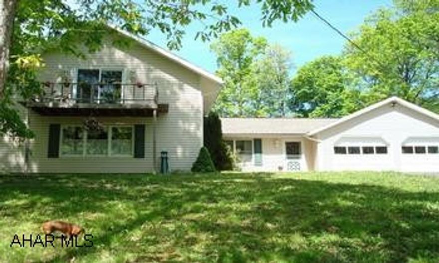 Very private setting.  Balcony off Master Bedroom.  Propane fireplace in Family Room (on Thermostat). Stone fireplace with woodburning insert in living room.  Roof & siding 4 yrs old. Very private setting.  Balcony off Master Bedroom.  Propane fireplace in Family Room ( on thermostat). Stone fireplace with woodburning insert in living room.  Roof & Siding 4 yrs old.