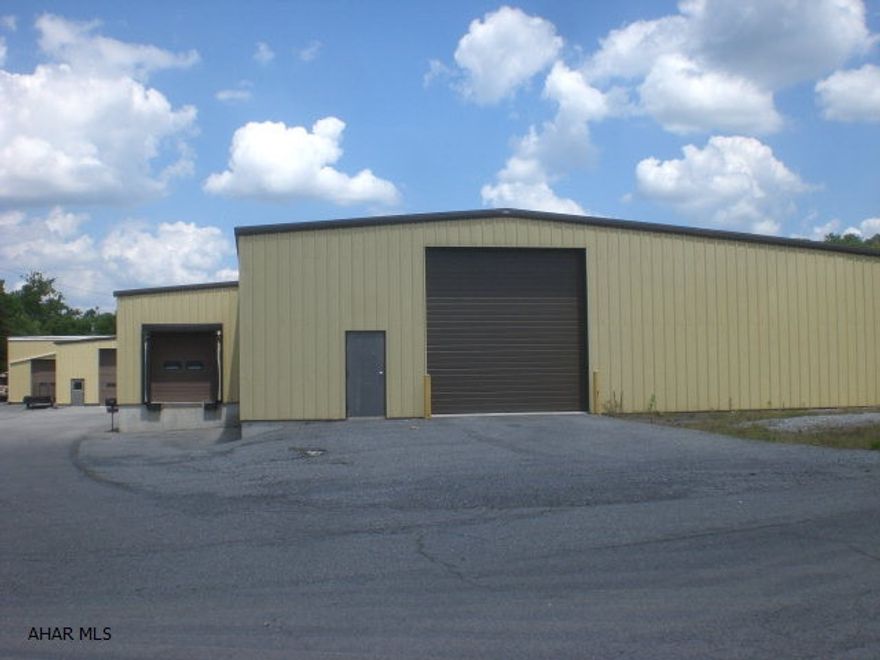 One-story building containing 31,480 sq ft, 4 docks, overhead insulted doors, 440 3-phase electric, heat pumps, natural gas & oil heat.  Dividable space, great for manufacturing or warehousing. Terrific location just outside the borough & close to all major roads. Nice building.