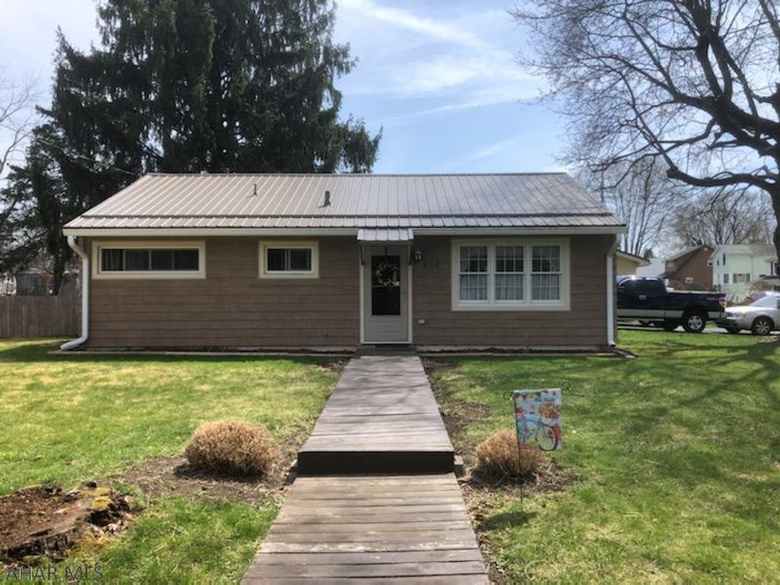 Very Sweet One Level Living Home on a flat 3rd of an Acre, Corner Lot. Fenced in yard, Large 2 Car Garage, Beautiful Covered Back Porch to enjoy entertaining or just a relaxing cup of your favorite beverage. New Roof 2017, Siding 2017, Central Air 2017, Furnace & Hot Water Heater 2017, Appliances 2016, Garage Roof 2018.