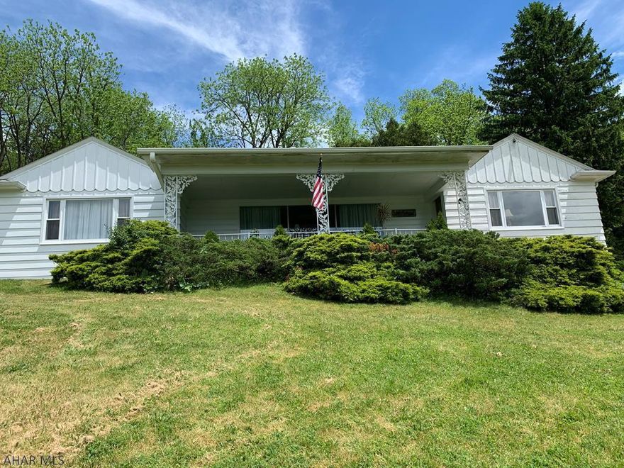 Enjoy your privacy without giving up perks from downtown Bedford! The floor plan encompasses plenty of entertaining areas including a comfortable living room with a fireplace that connects to an impressive bonus room with endless uses including another fireplace. Two spacious bedrooms, two full bathrooms, a formal dining room and kitchen. Hardwood floors in multiple rooms of home.  Don't miss the lower level!  Great place for more easy living! Two huge gathering areas with a walkout to the beautiful views of Bedford and nature. Enjoy the private nature views from the back patio or the beautiful sunsets from your covered front porch.  This house screams lots of space, spectacular views,convenient location! Prepare to make this your Home Sweet Home and schedule your showing today!