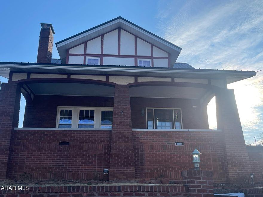 Beautiful brick 4plus bedroom home in the borough of Roaring Spring. This home is very well maintained with tons of charm. It boasts pocket doors in between the living and dining rooms, window seats with storage, double staircase and built-ins in the master bedroom. There is radiant flooring in the main bathroom! Natural woodwork adds so much character to the home, as well. The home has 2 fireplaces. The living room has a wood burning fireplace and the basement has a gas fireplace. There is also a kitchen in the basement for easy entertaining. An office or a bedroom sits off the dining room.  And don't forget the lovely stained glass. windows! Don't miss out on this one!