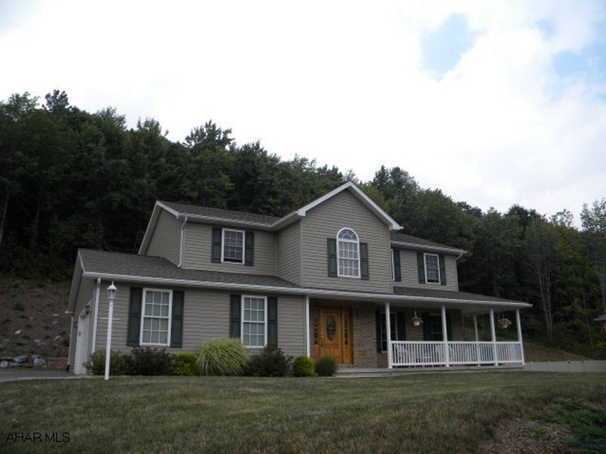 very well maintained 2 story with finished basement. This home sits up on the lot just enough to offer a great view from the covered front porch. The kitchen /family room is open with gas fireplace. There are French doors that open out to the covered patio and the private back yard. Each bedroom has a ceiling fan..laundry is on the 2nd. floor. Plenty of closet space. Basement is partially finished and has 1/2 bath. House is located very near Juniata Gap grade school. super location....low taxes....move in today