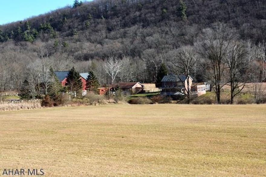 Beautiful country farm with a hard to find setting in South Central, PA. This property offers a 4 bedroom, 1.5 bath farmhouse, detached garage, bank barn, outbuildings, 1800's log home, pond, stream. and much more.  Borders State Game Lands on two sides and provides excellent privacy to get away from the hustle and bustle of life.  Easy access to PA Turnpike, I-70, & I-68.