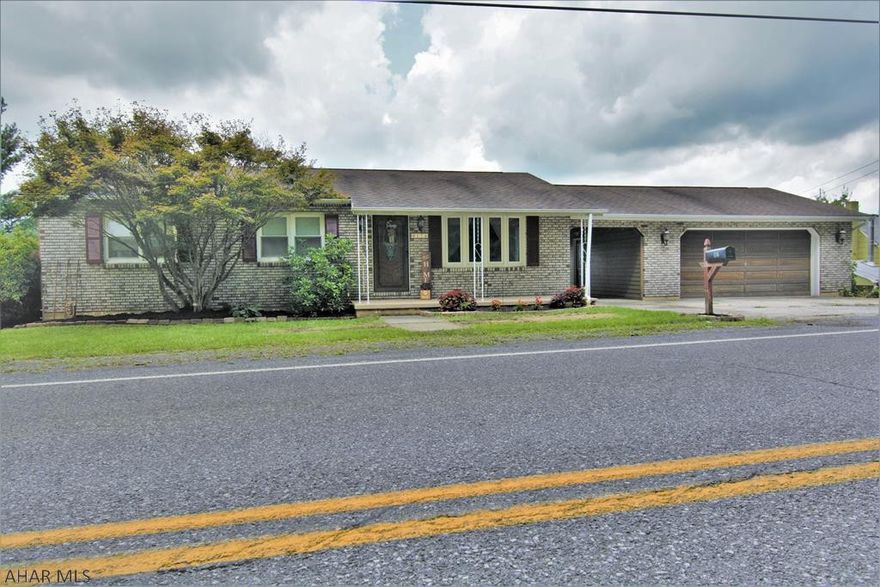 SUPER SWEET SINGLE STORY-- with finished basement too! This adorable Ashville 3 BR, 2.5 BA home is welcoming & inviting. Upon entry you are greeted with beautiful hardwood floors & an open look into your kitchen & dining area, with an island & sliding doors to a spacious back deck. The living room is homey & has a *BRAND NEW* bow window which means enjoying natural light without a draft! You'll find 2 spare bedrooms & a Master bedroom with a nice sized closet & it's own half bath. Downstairs is a large Family Room, 3/4 Bath, Workshop, Laundry Room & Storage room. The basement is walkout to the large covered cement patio out back. Home has a breezeway leading to the two car garage (approx 24' x 24') with storage area underneath & a seperate shed. Call today to make this home yours!