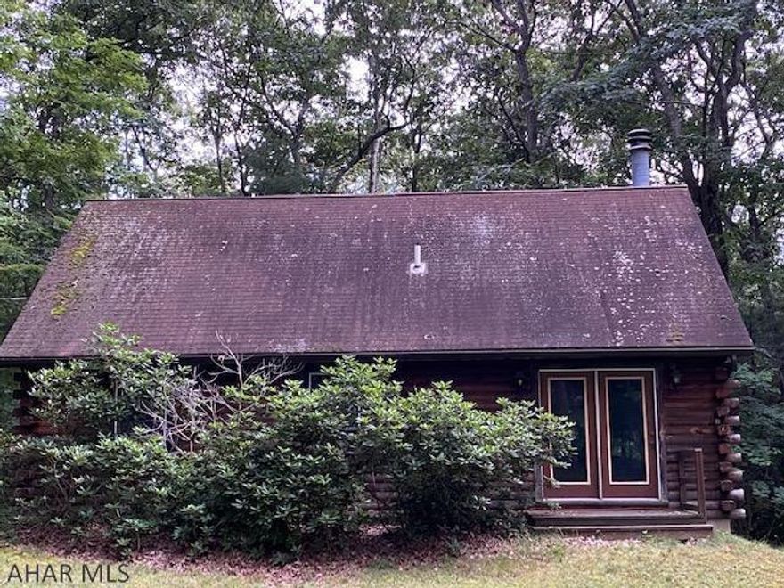 The perfect getaway!!! A little place in the mountains, a walk down to the Juniata River to do a little fishing or to find a spot to just to sit under a tree and read a book. There is no better feeling than to relax and rest in the woods under the moonlit nights and just reminiscing this home features two bedrooms and a loft for family gatherings. A cozy kitchen where you can sit around the table and enjoy a hearty mountain breakfast. The fireplace is a great place to cozy in front of and warm up after a nice autumn day out in the mountains. Just a walk to the river, a hike to the mountains and a stones throw to great biking trails.don't miss out on this great getaway!!