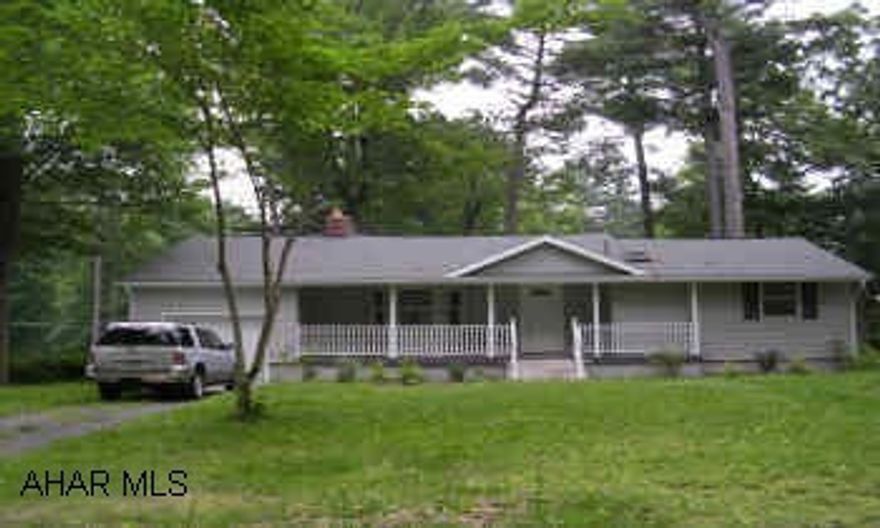 ONE STORY WITH ATTACHED ONE CAR GARAGE. TOTALLY REMODELED RANCH WITH STUNNING OAK KITCHEN WITH 1ST FLR LAUNDRY.  BATH WITH SKYLIGHT.  COVERED DECK PORCH OFF KITCHEN.  NICE FRONT PORCH.  3RD BEDROOM COULD BE DEN OR OFFICE.  BEAUTIFUL LOT.  SUPER AREA!  PRICE CHANGE REFLECTS - UPDATING ELECTRICAL AND HEATING AND ALLEVIATING PUDDLING IN BASEMENT.