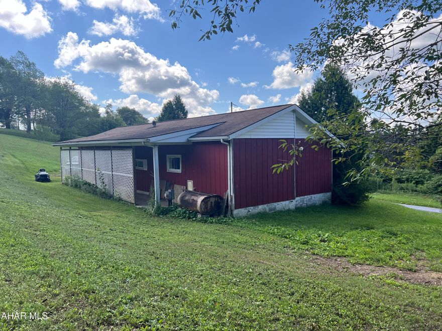 One story T-111 sided on a 86x250 irregular sized lot. This home was used as a rental and the interior needs remodeling.  Excellent project home or flipper. Priced to sell.