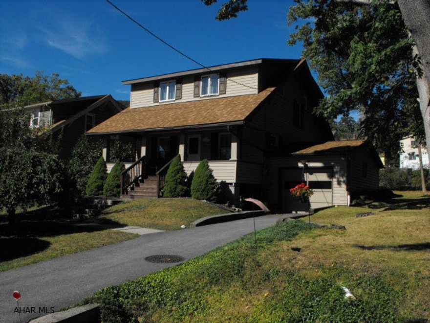 Large bright rooms.  Modern oak Lakeview kitchen & modern bath.  Nice covered porch off dining room which looks out over private back yard.  House is at end of dead end street.  McIntosh & Golden Delicious Apple trees in the yard make yummy applesauce.  Many improvements make for maintenance free living.