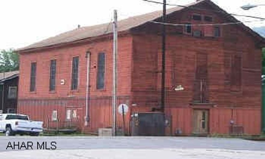 HISTORIC BUILDING!  BUILT IN 1855.  3 PHASE ELECTRIC, GAS F/A HEAT, PUBLIC WATER AND SEWER.  40X60 BUILDING.  1ST FLR 8' CEILING, 2ND FLR 18' CEILING.
