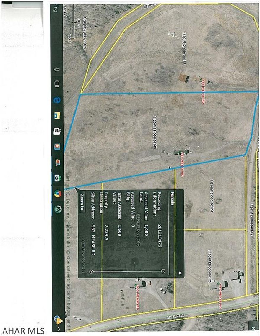 7.23 acres had a mobile home on - since removed. Nice rural location.  Septic system installed but need top coat finished. Public Water.
