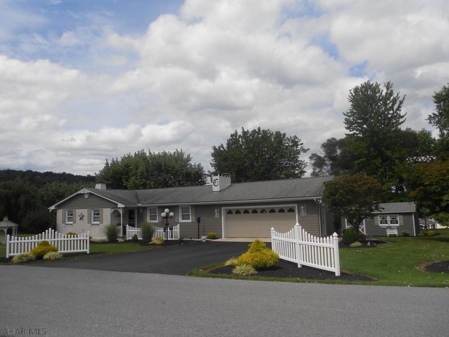 Ranch home on .888 acre, vinyl and brick, paved driveway, 2 car attached garage with New 18ft door, large deck in the back to enjoy leisure time, gazebo for added charm, rear enchanting storage shed with electric and a generator hooked to the house to help during power failures. Dining area, living room w/ inviting brick fireplace, country eat-in kitchen w/ french doors that lead to the large rear deck. 3 bedrooms and 2 baths complete the main level. Head down to the basement and find a large family room with a wood burning stove , large laundry room, extra bedroom and a finished gathering room that leads to the new basement door complete walk- out. Private well and septic system ,electric baseboard heat , plus wood burning stove in basement for added warmth. Manicured and immaculate!