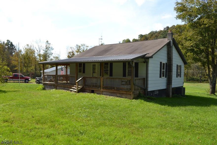 Ranch home located in southern Bedford County with easy commute to Bedford, Cumberland, Rocky Gap Casino and Resort.  Situated on a flat 1.75 acres this house has a large wrap around porch, central AC, detached 2 car garage, basement with workshop area, dining and living rooms, and newer kitchen appliances. Ready immediately for showings, give us a call!