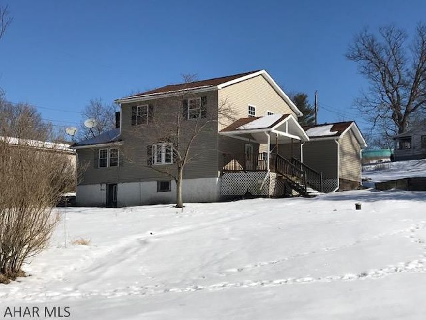 5 bedroom, 2 bath home on 0.32 acres in Logan Twsp.  Newer windows, new carpet, Private setting.