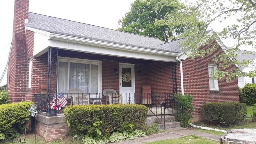 2 lots! 1 story! Central Air! Cozy 2 bedroom brick home on a corner lot in Eldorado area. The home has lots of original wood charm throughout within a beautifully constructed brick frame. All 1 story living, with a very spacious attic that could be finished. Kitchen has an open-feel to the dining area. Very large basement with recently resurfaced concrete. Carport in rear, with driveway large enough to hold 2 vehicles. Easy access to highway and shopping. Motivated Sellers!