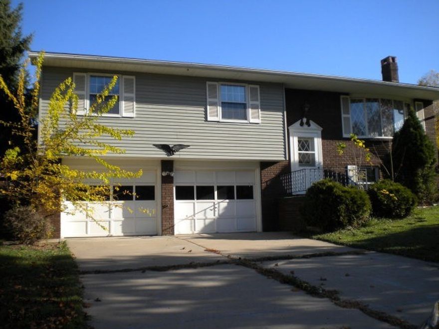 3 Bdr., 2 Bath - 2 Car Garage - Family Room With Wood Stove - Fenced Yard - Roof And Ceiling In Front Bedroom Was Repaired In Dec. 2010 - Carpets To Be Cleaned.