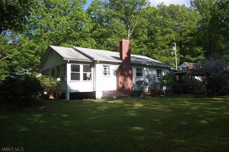 This property is located on Cypher Road by the Juniata River.  Get away for a weekend or use it as your home.  All furnishings in home are included in the sale of this property.  There is a wood burning fireplace in the living room, large enclosed Sunroom for extra guest, an outside patio with a brick gill area for cook outs.  Property is close to Raystown Lake, Bike Trail, Fish from the front yard or through your kayak  in  and have some fun.  Options are endless.  There is a full basement, vinyl windows throughout, large rooms, Breakfast nook off the Kitchen, One garage for your car and one for the golf cart.  Schedule a showing today and see it all for yourself.  Call listing agent for a personal tour.