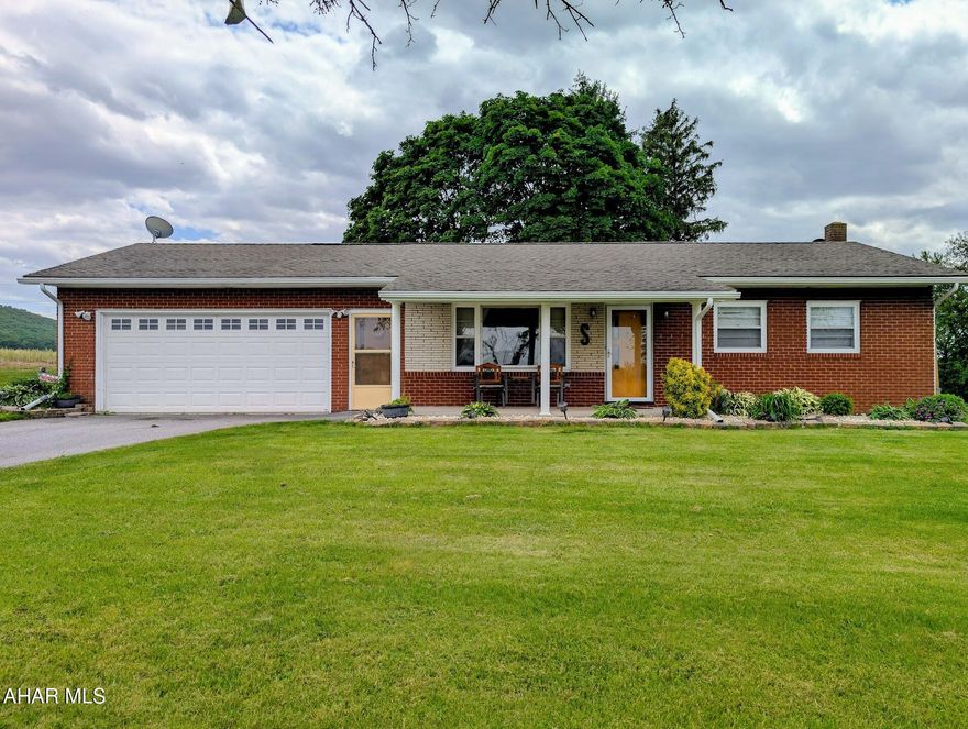 Welcome to this well-maintained three-bedroom, two-bath ranch situated on 1.095 acres with beautiful views and a private setting. The home features central air and a pellet stove for added comfort and efficiency.

Enjoy relaxing on the inviting front porch or spending time in the nice backyard, perfect for outdoor gatherings or quiet evenings. The partially finished basement offers extra living space — ideal for a family room, home office, or hobby area. An attached two-car garage provides convenience and additional storage.

A wonderful blend of comfort, functionality, and scenic surroundings — this property truly feels like home.