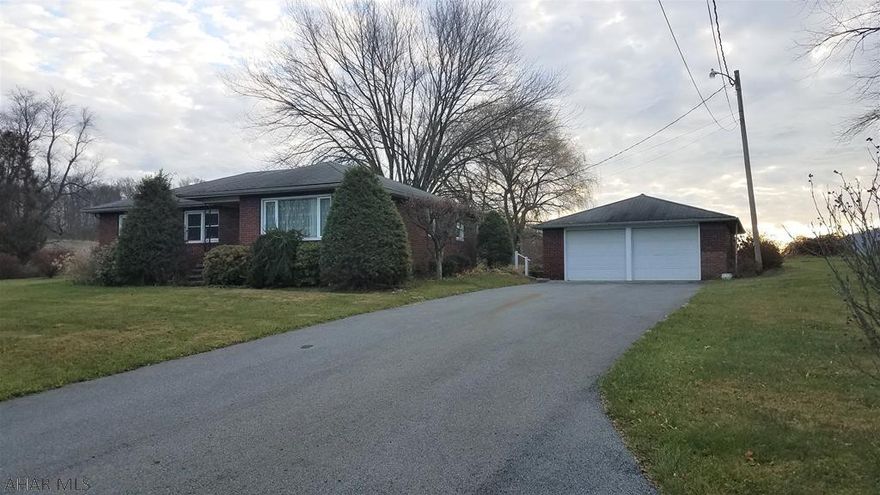 You won't want to miss this charming, newly updated, well-built brick ranch home with plenty of yard space in a great location. It features new flooring throughout much of the home, the kitchen has been updated, two 100 amp electrical panels, a full, partially finished basement, a detached brick-framed two-car garage and a macadam driveway. The large yard has great shade trees for lounging beneath and plenty of garden space. If you are looking to downsize or for that perfect starter home, come have a look. Conveniently located between Bedford and Everett; this home is located close to UPMC Bedford Hospital, WalMart, Weis Market and minutes from downtown Bedford, the PA Turnpike, Interstate 99 and Interstate 70.  Square footage and acreage are from Public Records; buyer should verify.