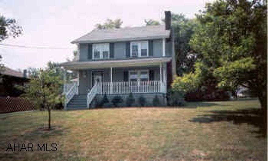 Green vinyl sided 2-story on .37 acres, level lot. Nice family home with an addition on the back.  Large living room, den or family room, 2 BA, and a sun room.  Don't miss the nice tiered deck, all on a level .37 acre lot.