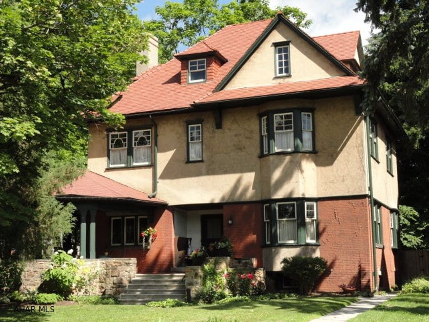 One of a kind historic 4-6 bedroom, 3.5 baths. 3 story Victorian charmer. 9-10' ceilings. Original wood trim, hardwood flooring, built-ins and light fixtures. Beautiful stain glass windows and original staircase. Renovated kitchen w/walk-in pantry. Original butler's pantry w/1st floor laundry. Master w/renovated full bath. Stucco/brick exterior, tiled roof, wrap-around veranda, large back yard leading to original carriage house and stone entrance. (property 1 block deep). Magnificent property, too many features to mention. See listing features in other documents.