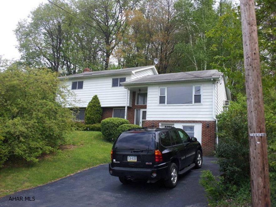 3 bedroom split-level home with finished basement. Fireplace in family room. 2 1/2 baths. Good location near schools and hospital. Lots of finished area.