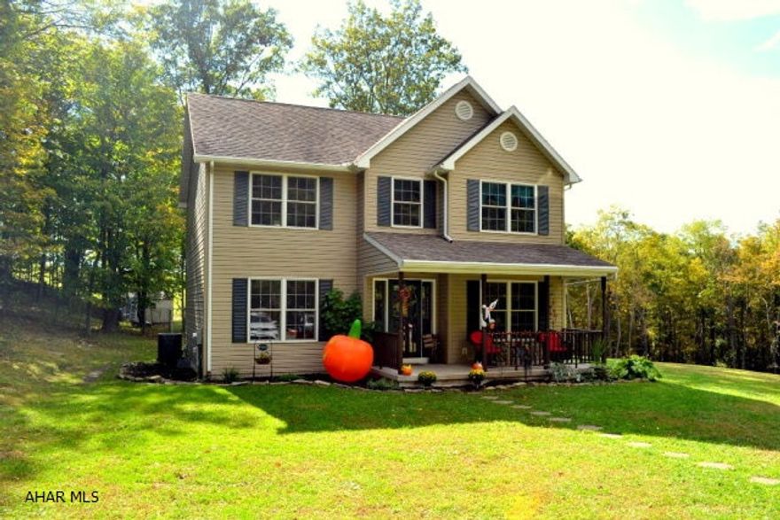 An absolute must see home! A wonderful setting for this 3 bed 2.5 bath two story on a private 9/7 acres.  A 2003 built home in move-in condition.  Eat-in kitchen opens to a large back deck, separate dining room, spacious family room and first floor office/den.  Grand foyer with lots of natural light.  Full Master suite with nice walk in closet. Second floor laundry for easy access to all the bedrooms.  Easy to maintain heatpump, walkout basement, all kitchen appliances included.  Call to make this your home today!