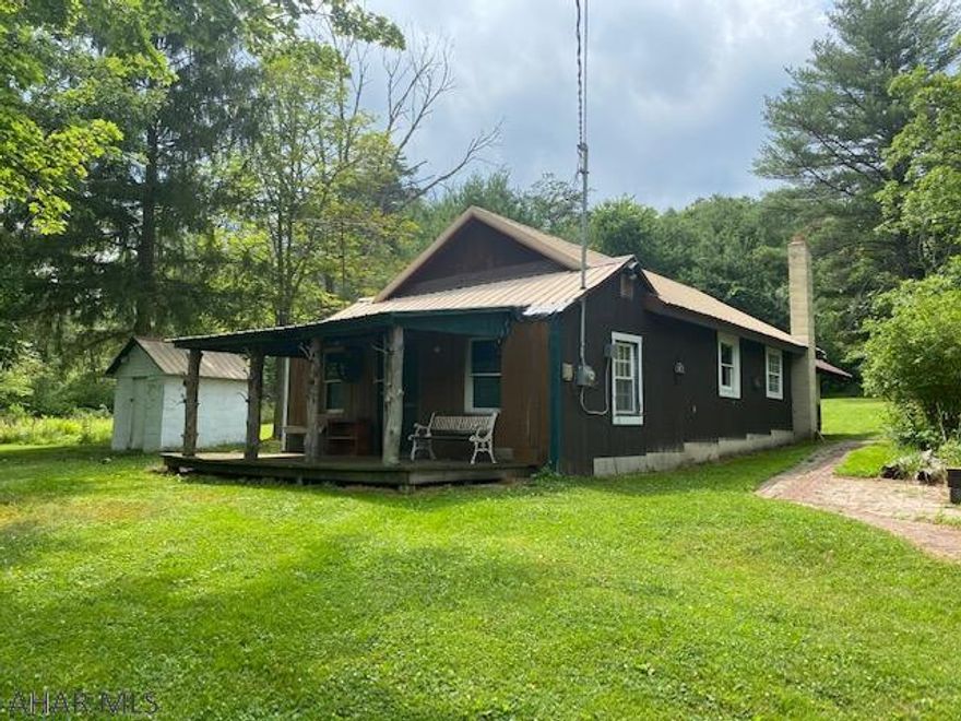 Are you dreaming of a country getaway? Do you want somewhere that has a natural mountain spring that flows fluently and continuously so there will be plenty of water for your family and livestock? I have found it for you. This property has been used as a hunting cabin,It is not fancy but it is very unique. There's plenty a room for life stock, the barn is built with great craftsmanship. The hunting is phenomenal for both turkey and deer. Here you will be close to state game lands and state parks for all your outdoor needs and country entertainment. You will be just minutes away from the great Fulton County fair, Cowan's Gap state park, and the best buckwheat pancakes in the world at Burnt Cabins Grist Mill.. hungry patrons come from counties around for these pancakes.