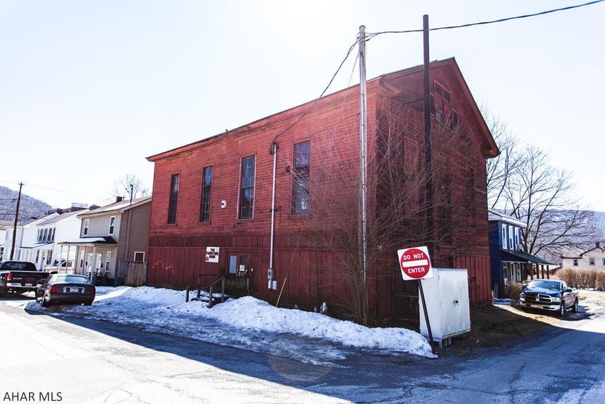 Very large barn with lots of potential. Large, open second floor with offices on the third floor.