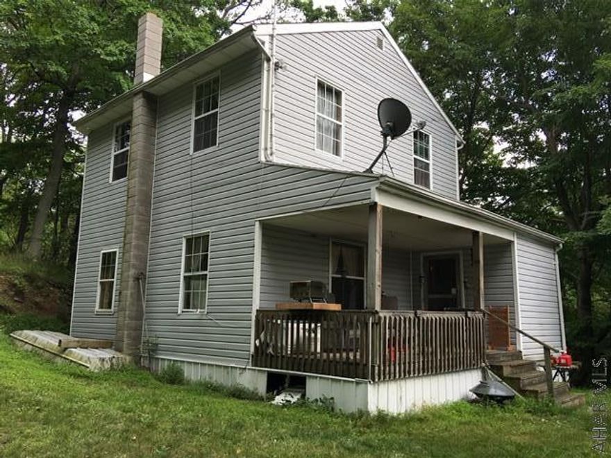 HUNTERS, HUNTERS, HUNTERS, REMOTE HUNTERS PARADISE---This hunting camp borders 10,000 acres of State Game Lands!!!!  Plenty of wildlife surrounds this Hunter's cottage, deer, bear and turkey and much more! Peaceful and secluded and great views in the Fall. Deeded Right-away and this property is in the Clean and Green Program.  Association Fee $75 a year for maintaining the road this does not include snow removal.  Built in 2003, a 2 story home with a wood burner and plug in electric heat.   Open floor plan combining oak kitchen, dining and living area and rec room!!!  3 spacious bedrooms and full bath on the 2nd Fl.  Covered front porch and mudroom.  10x12 Utility shed.  Fully furnished, personal  items excluded. SELLER WILL ENTERTAIN OFFERS!!