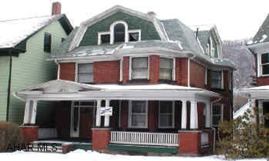 Large brick home, single family or duplex.  Off street parking