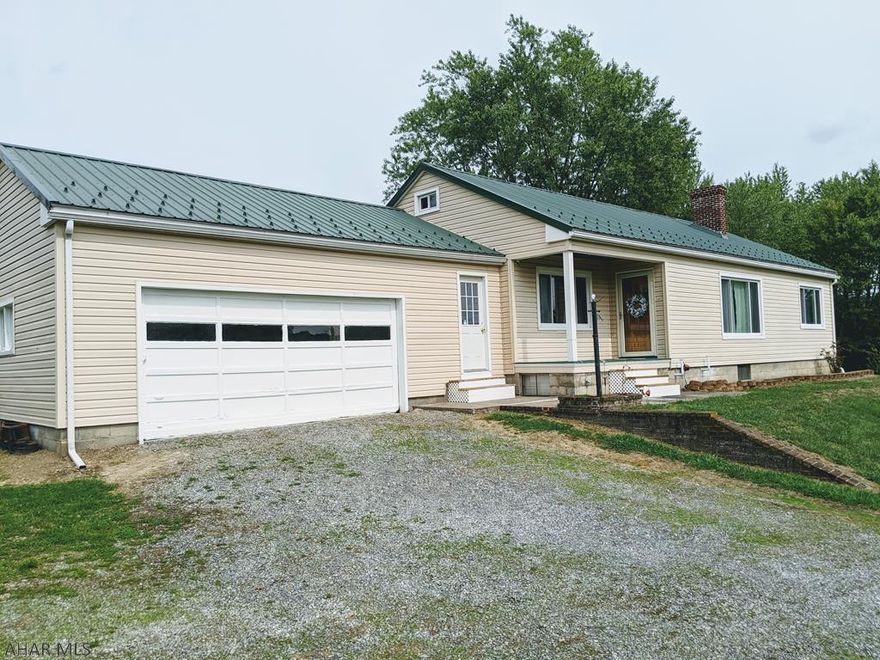 Beautiful 5 acres in Antis Township, Bellwood School District with a one story home. 3 bedroom, 1 bath, hardwood floors, walk up attic the length of the whole house, large open walkout basement, 2 car garage w/enclosed breezeway to house, additional detached garage for storage, large barn. Great location, minutes to downtown Bellwood, I-99 Highway, UPMC Altoona, PSU Altoona. This property is just waiting for you to make it your own! Schedule your showing today!