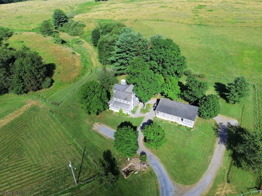 Picturesque equestrian estate featuring a beautifully remodeled farm house (3 Bed-3 Bath) with guest house (2 Bed-1 Bath) nestled in Southern, PA. The secluded setting allows for privacy, tranquility and space to roam, with easy access to the PA Turnpike and I-70. This unique property has so much to offer with two homes, 72'x120' riding arena with 6 stalls, 60'x60' shop, machine shed, fenced pastures, creek, and much more! NO DRIVE BY'S!