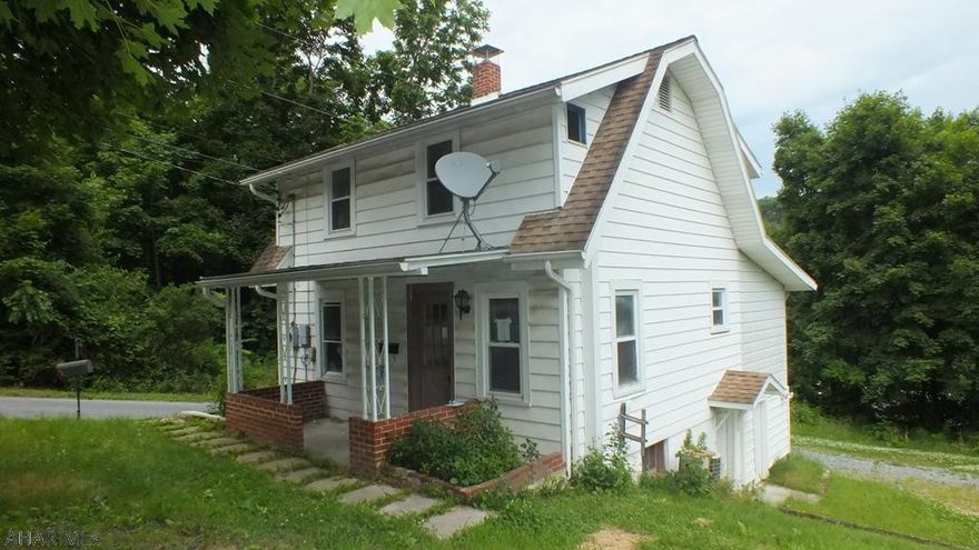 Everett area 2 story vinyl home in need of TLC. AS-IS sale. Seller will make no repairs.