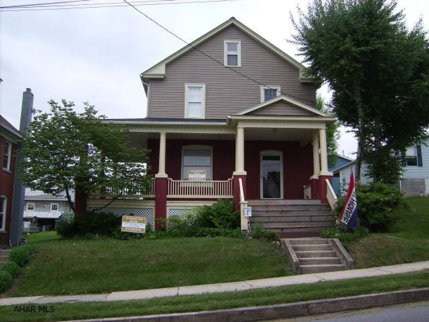Step Back In Time - And Enjoy The Charm Of This History Rich Home - LR, DR, Kit., 3 BR, 1 BA - Lg. Wraparound Porch - Deck - Garden - Detached 1+ Car Garage - Nicely Landscaped - All But 2 Windows Replaced - Garage New 1994 - Built In Big Screen TV In LR - Stays W/Property.